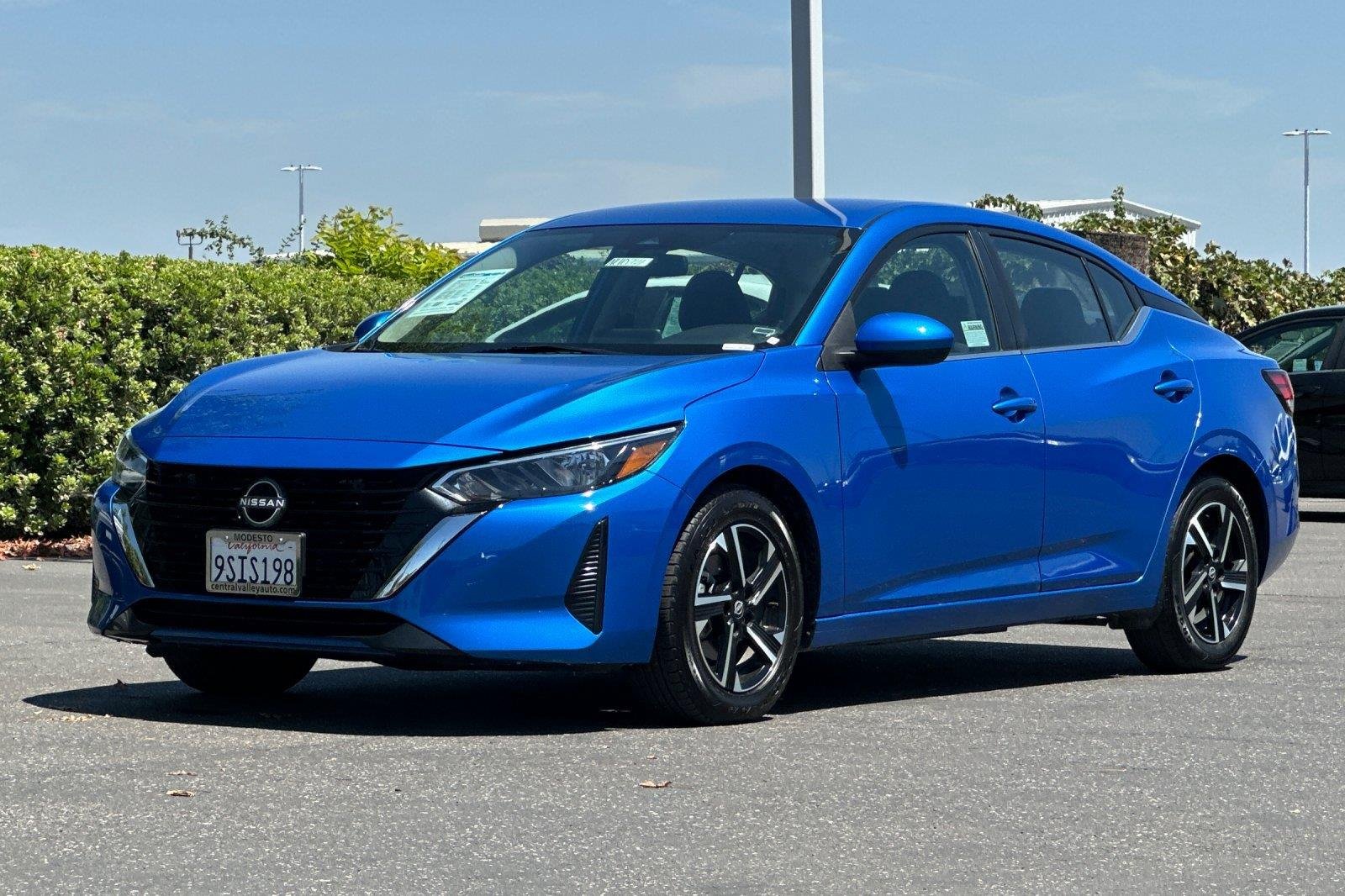 Used 2025 Electric Blue Metallic Nissan SV image 8