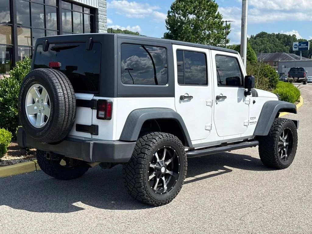 Used 2013 Bright White Jeep Unlimited Sport image 6