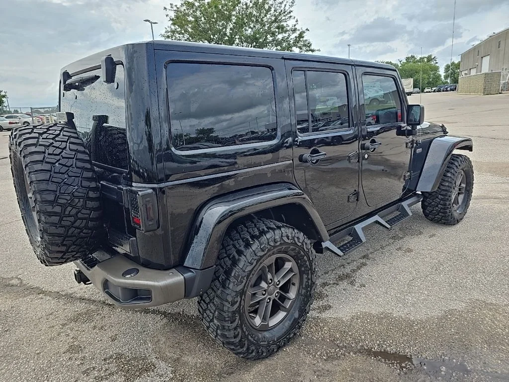 Used 2016 Black Jeep Unlimited Sahara image 7