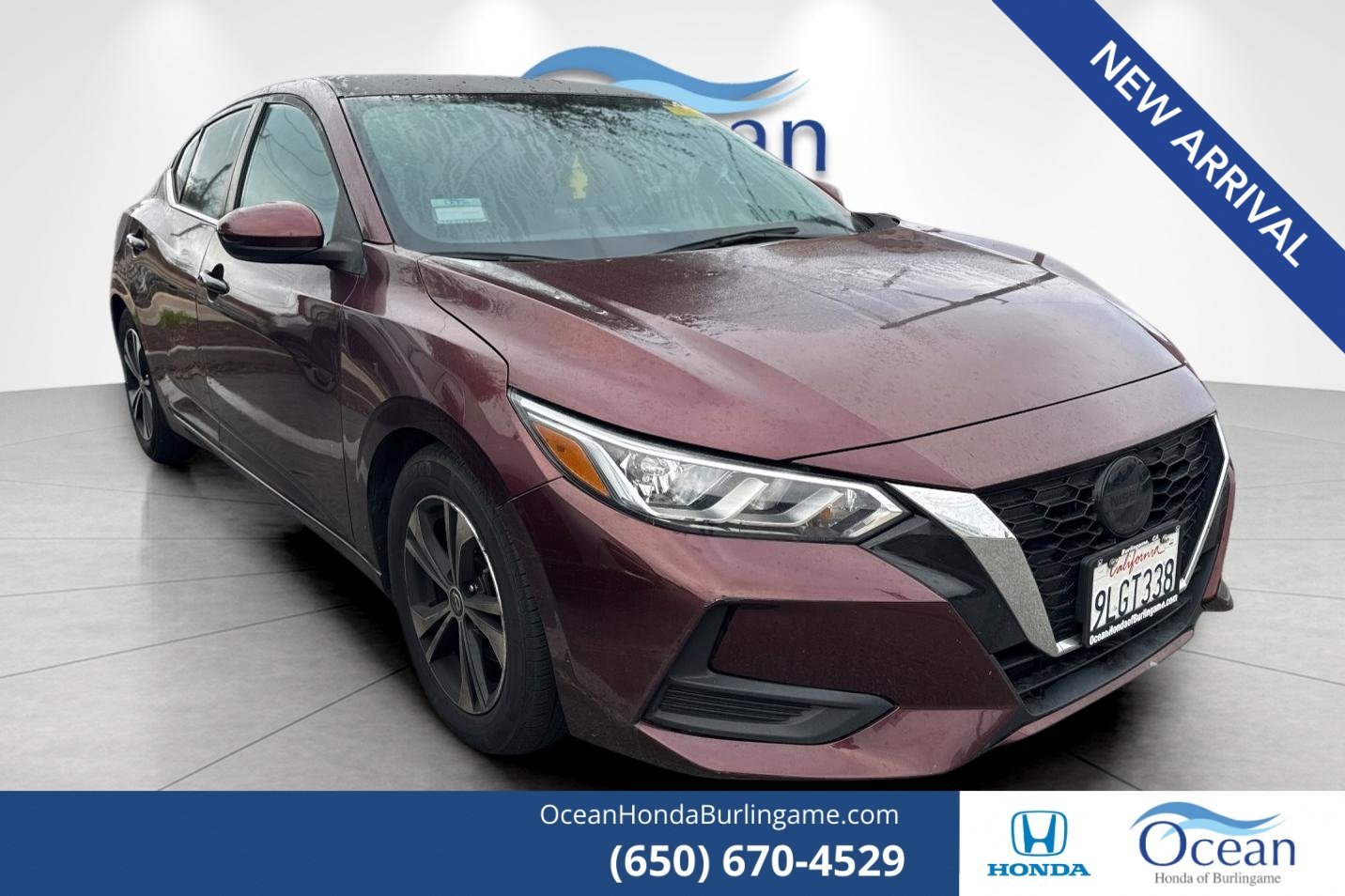 Used 2022 Rosewood Metallic Nissan SV image 1