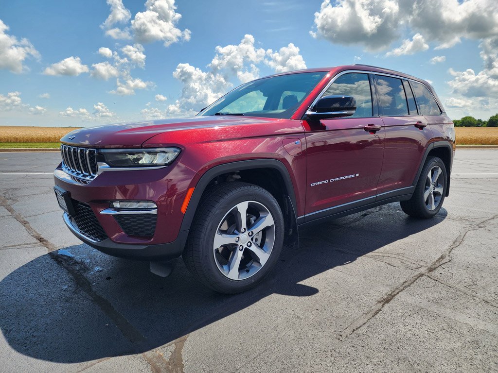 Used 2023 Velvet Red Pearlcoat Jeep 4xe image 1