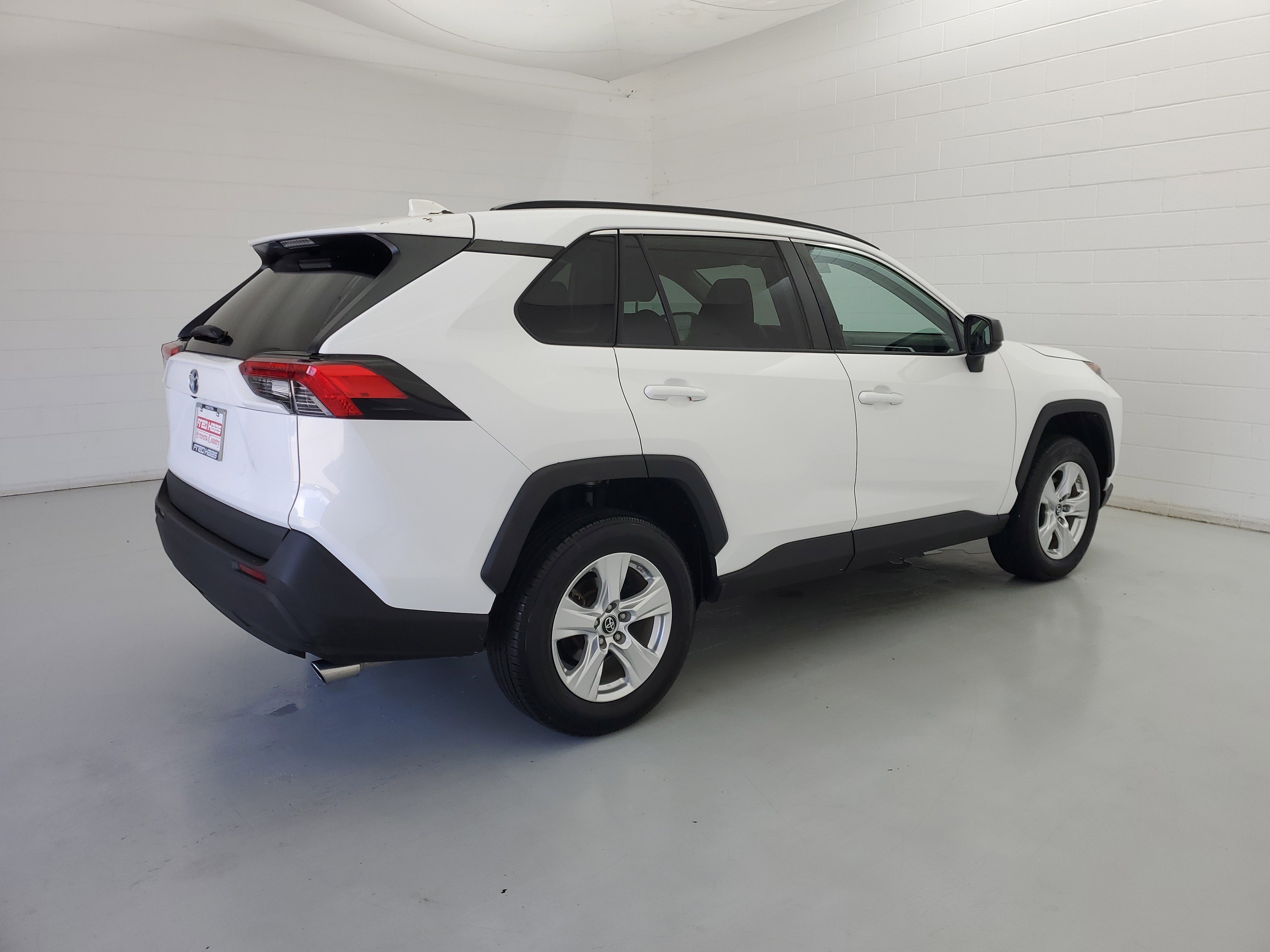 Used 2021 Super White Toyota LE image 5