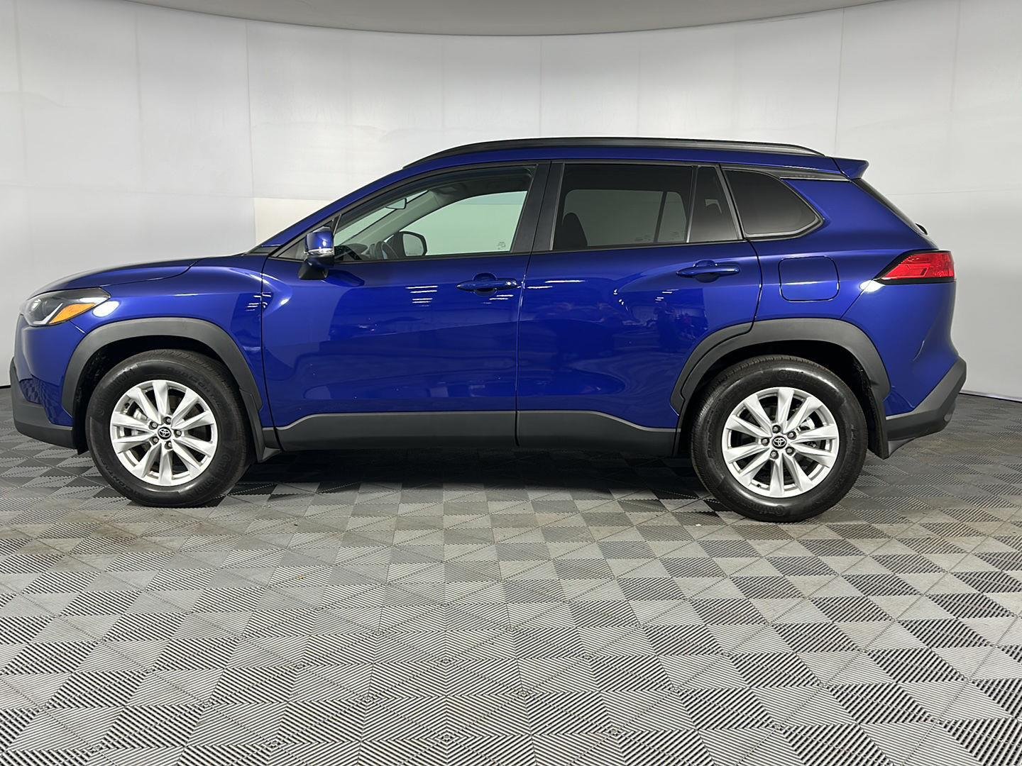 Certified Used 2024 Blue Crush Metallic Toyota LE image 4