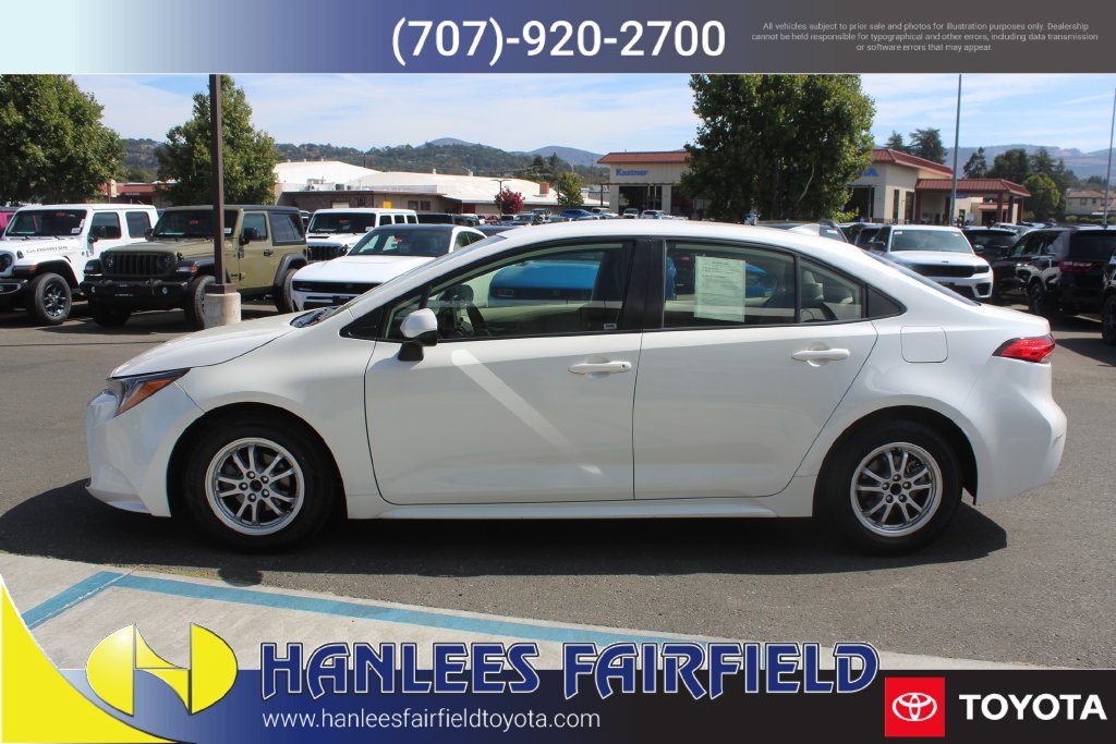 Used 2021 White Toyota LE image 2