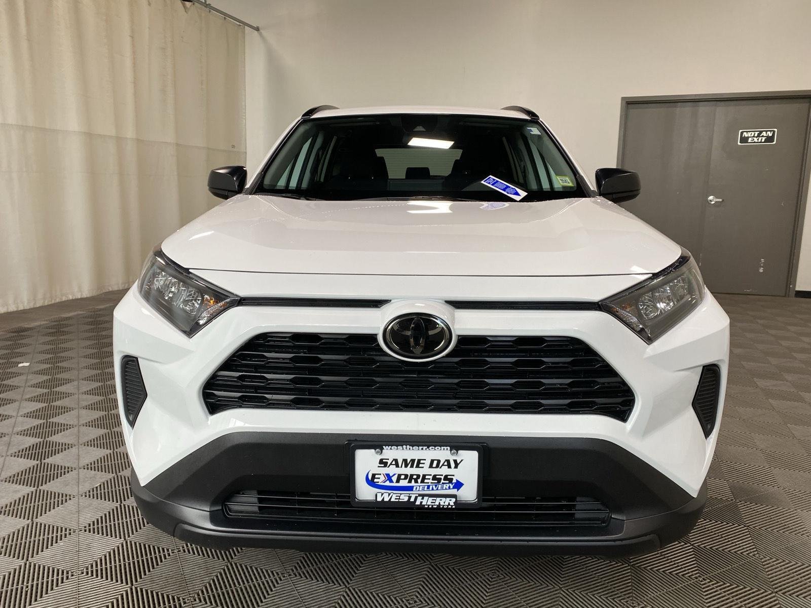 Used 2021 Super White Toyota LE image 2