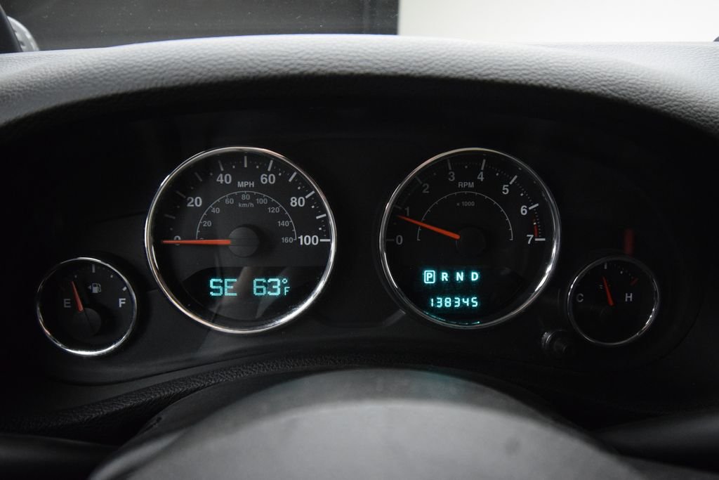 Used 2012 Bright Silver Metallic Clearcoat Jeep Sport image 14