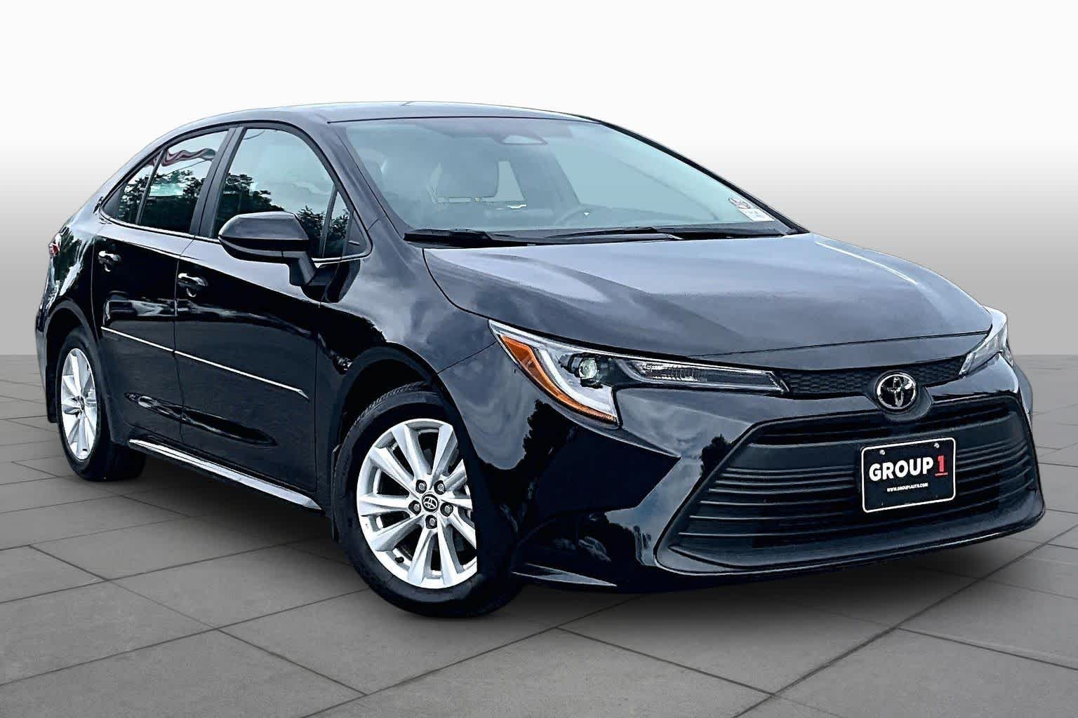 Used 2026 Midnight Black Metallic Toyota LE image 3
