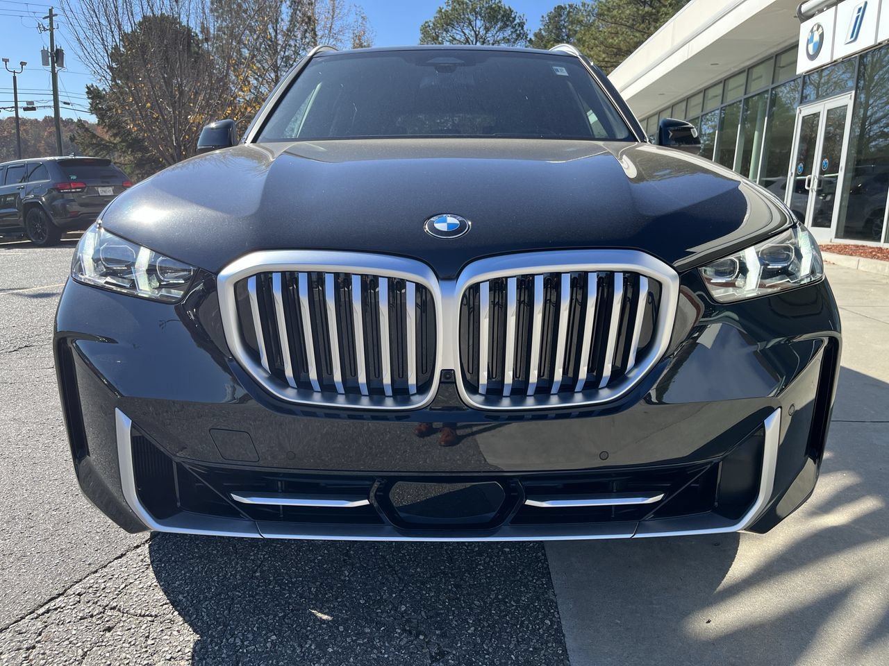 Used 2026 Black Sapphire Metallic BMW sDrive40i image 3