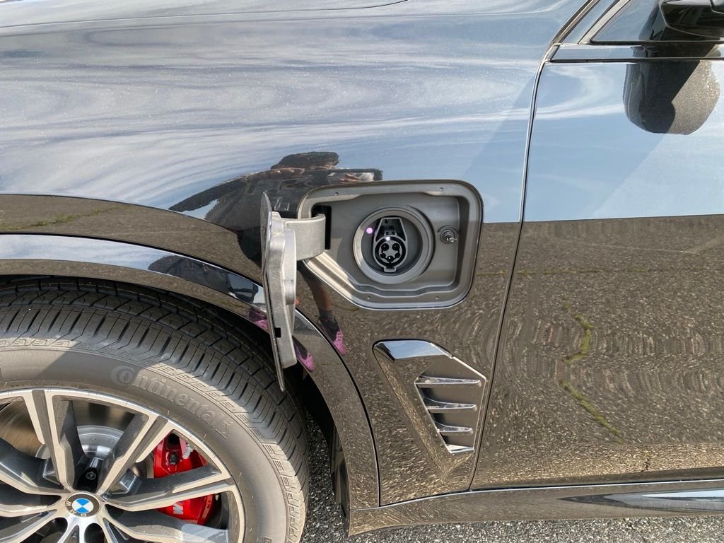 New 2026 Black Sapphire Metallic BMW xDrive50e image 14