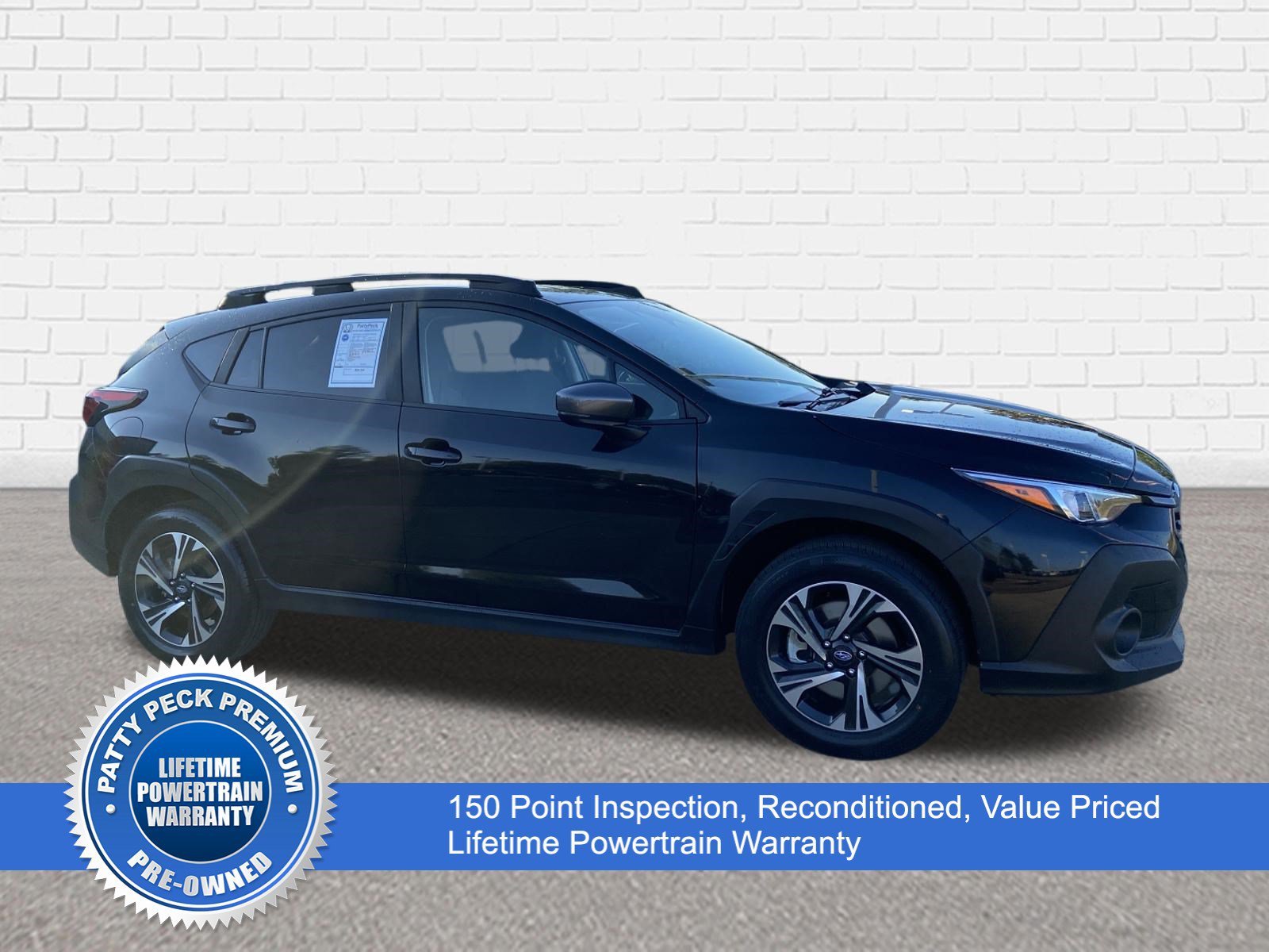 Used 2025 Crystal Black Pearl Subaru Premium image 1