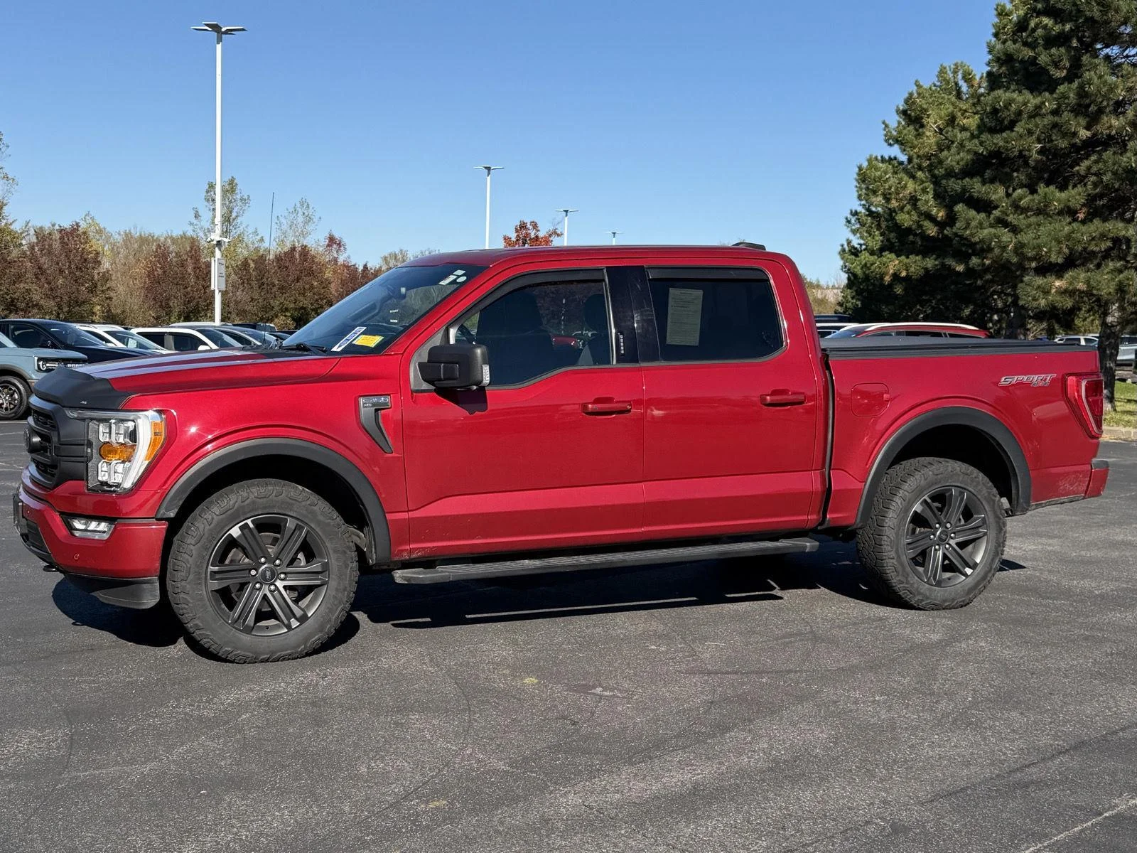 Used 2021 Rapid Red Metallic Tinted Clearcoat Ford XLT image 6