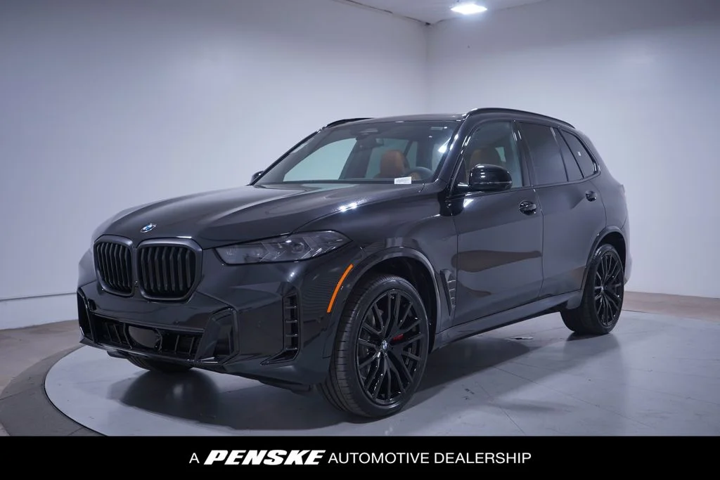Used 2026 Black Sapphire Metallic BMW sDrive40i image 1