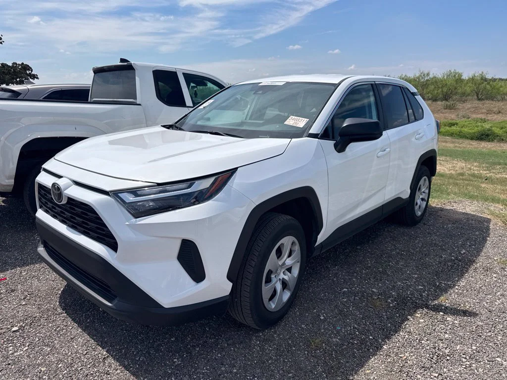 Used 2025 White Toyota LE image 1