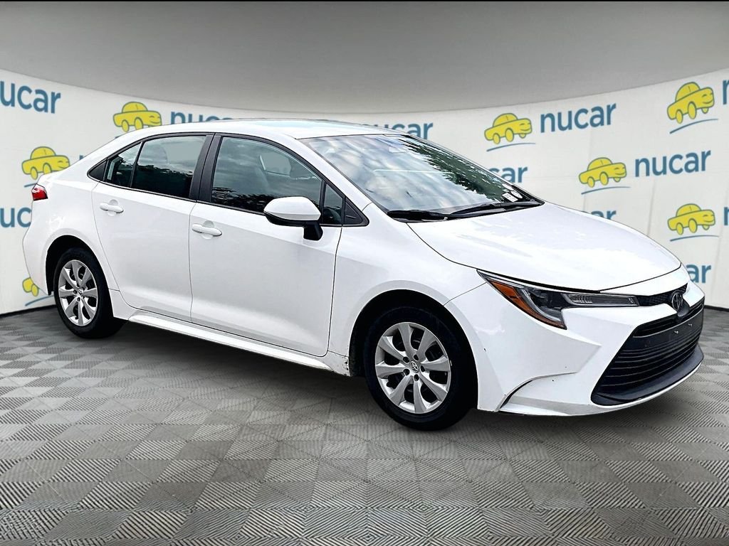 Used 2024 White Toyota LE image 1