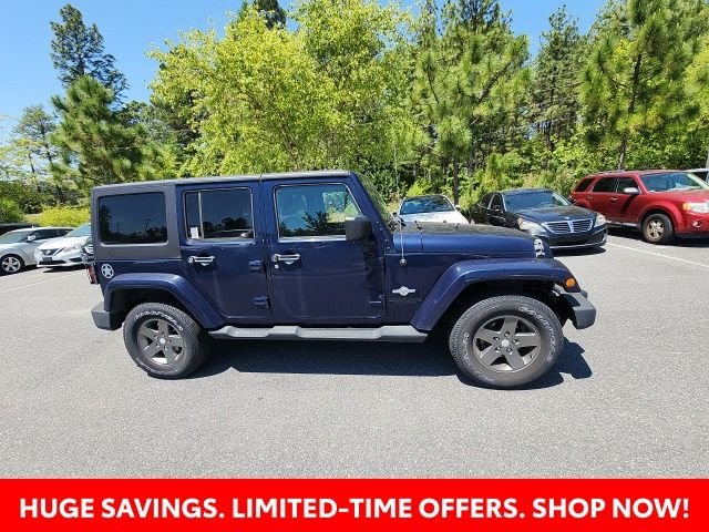 Used 2013 Blue Jeep Unlimited Sport image 19