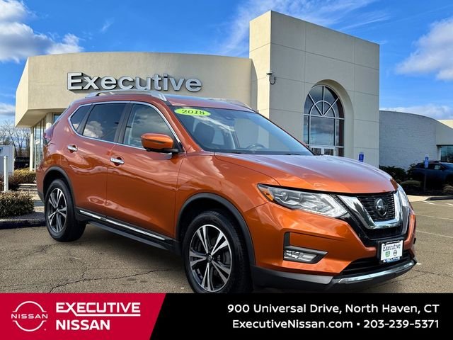 Used 2018 Orange Nissan SL image 1