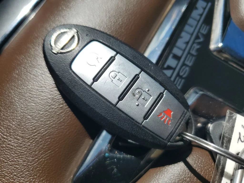 Used 2024 Gray Nissan Crew Cab Platinum Reserve 4x2 image 23