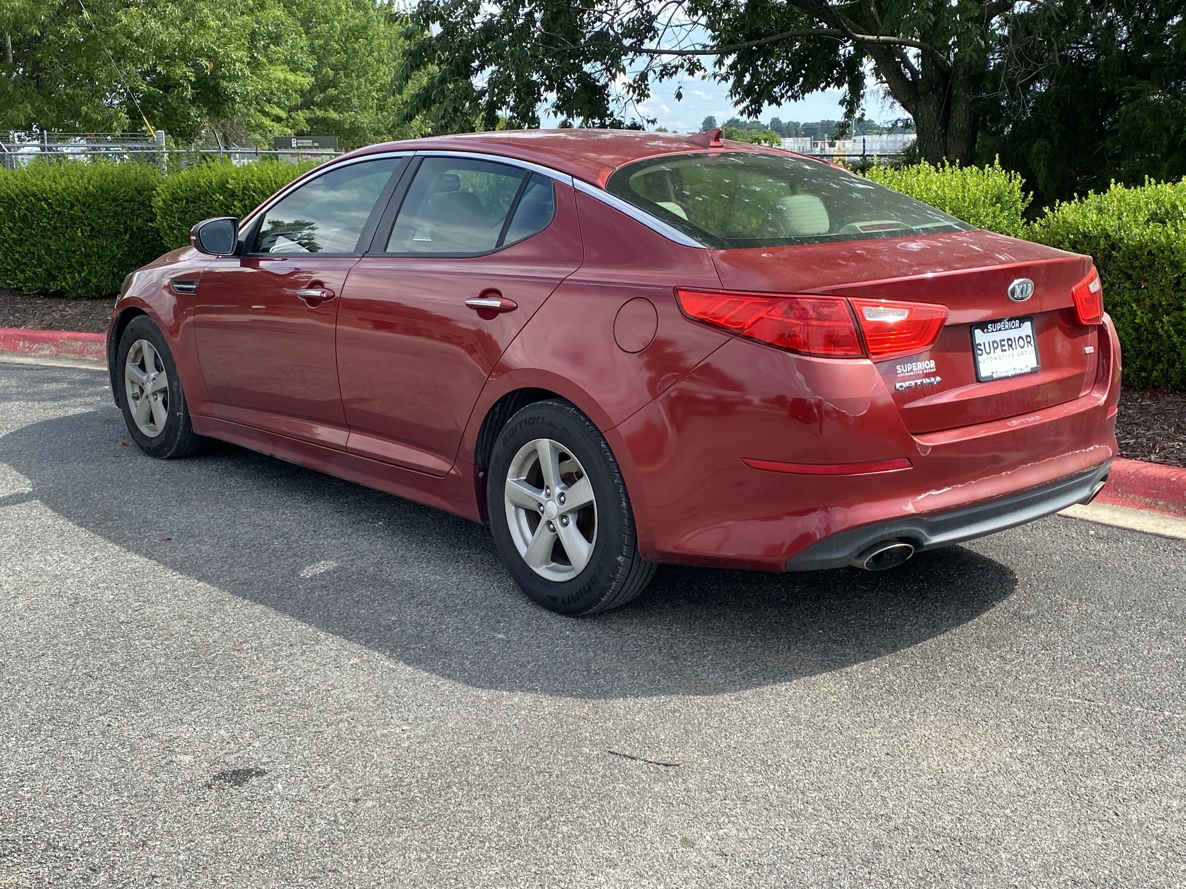 Used 2014 Remington Red Metallic Kia LX image 6