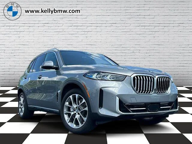 Certified Used 2024 Skyscraper Grey Metallic BMW xDrive40i image 1