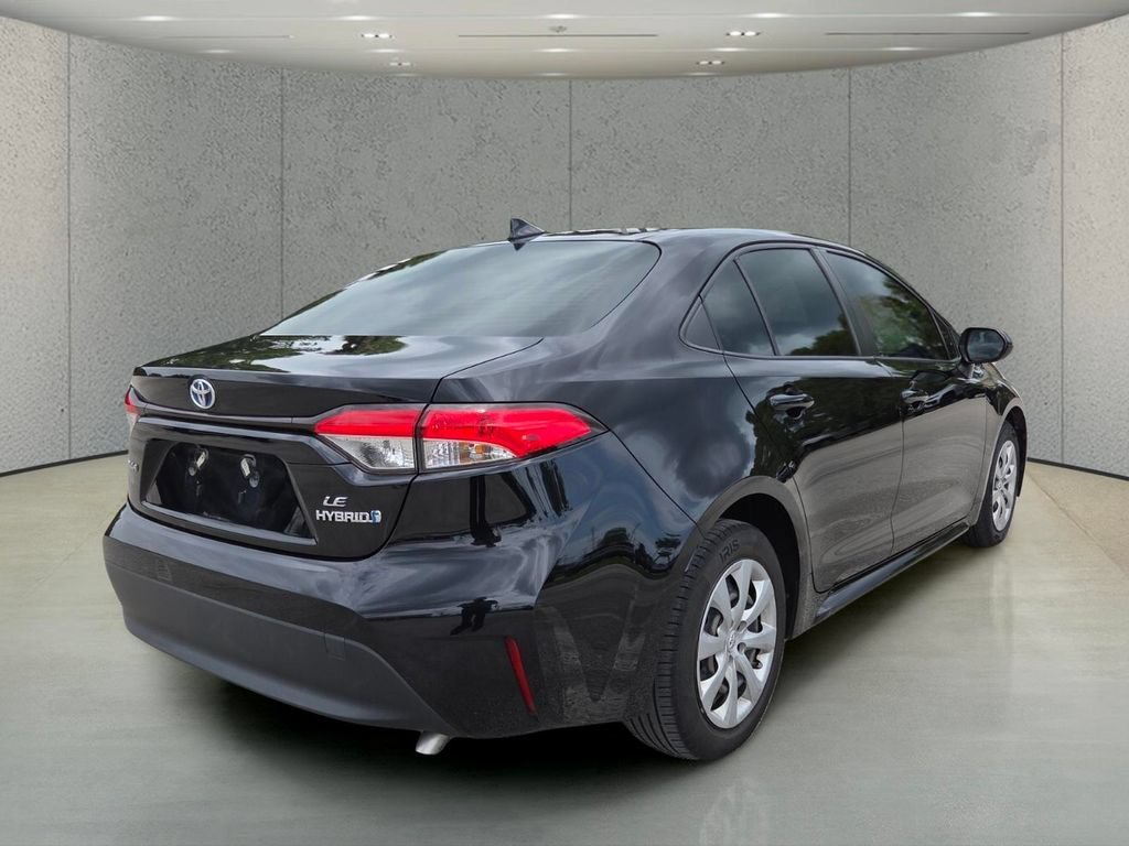 Used 2023 Midnight Black Metallic Toyota Hybrid LE image 5