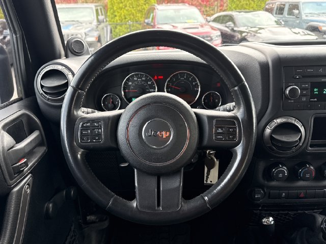 Used 2012 Black Clearcoat Jeep Unlimited Sport image 6