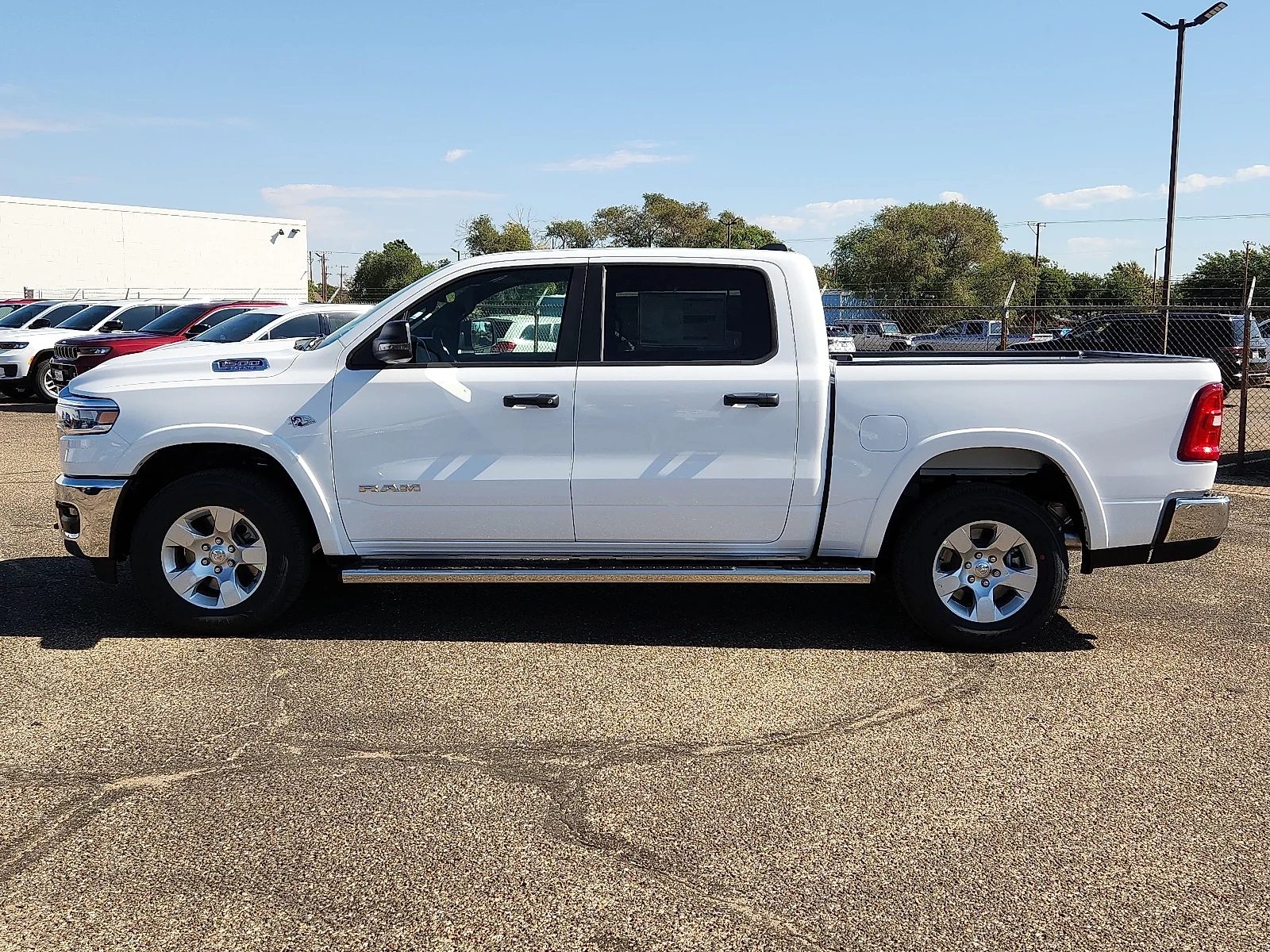 New 2026 PW7 Bright Whit Ram LONE STAR CREW CAB 4X4 5