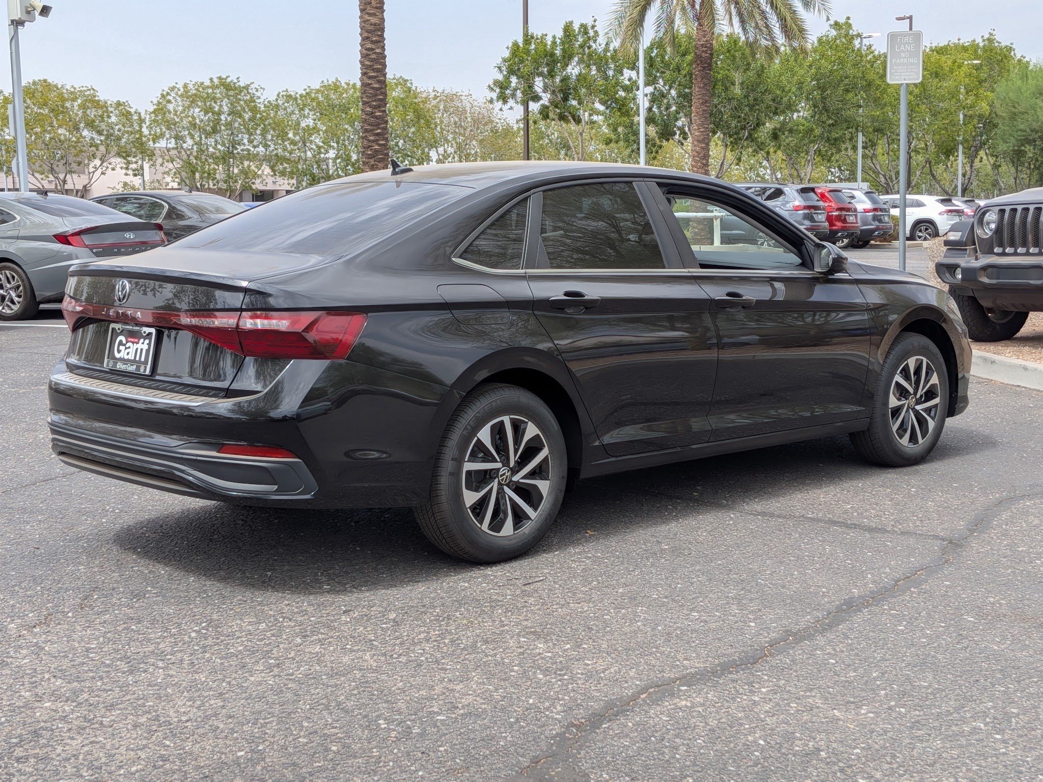 New 2026 Deep Black Pearl Volkswagen S image 3