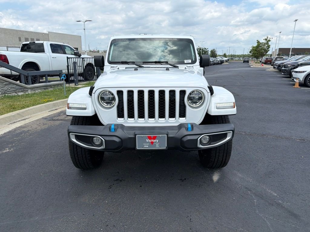 Used 2022 Jeep Wrangler Unlimited Sahara 4XE with VIN 1C4JJXP63NW230107 for sale in Kansas City