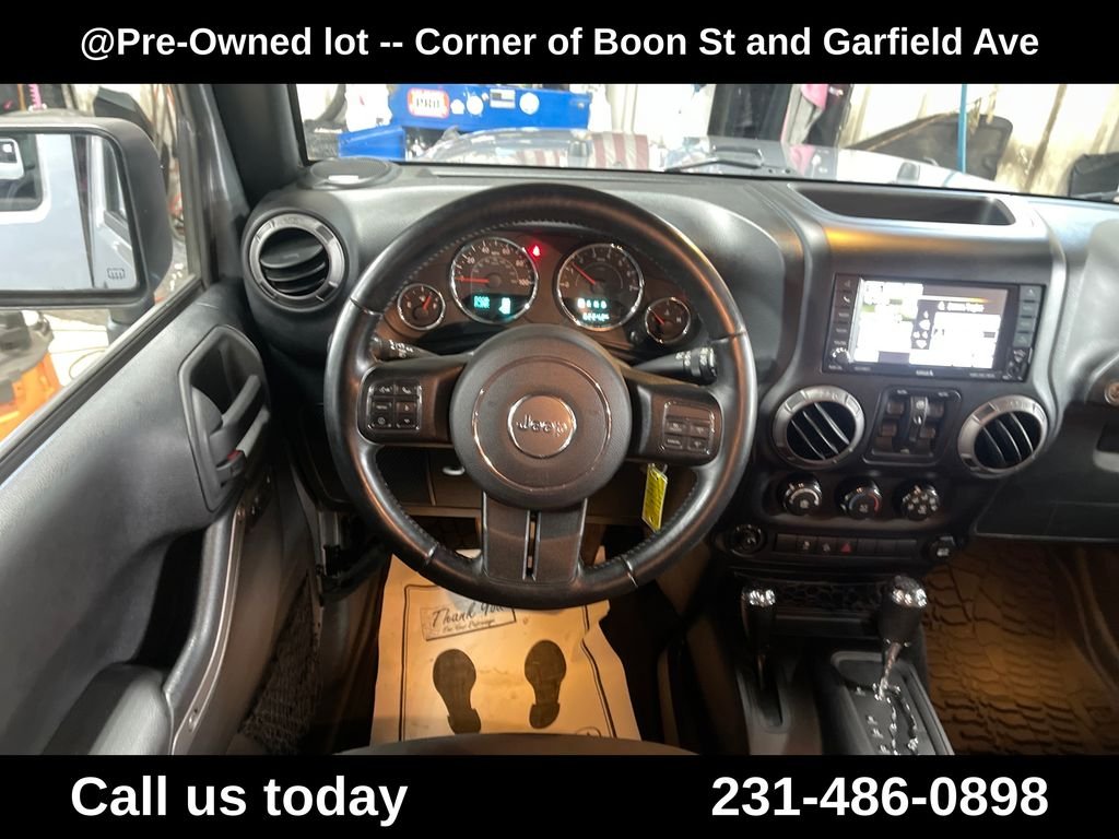 Used 2015 Silver Jeep Unlimited Sport image 17