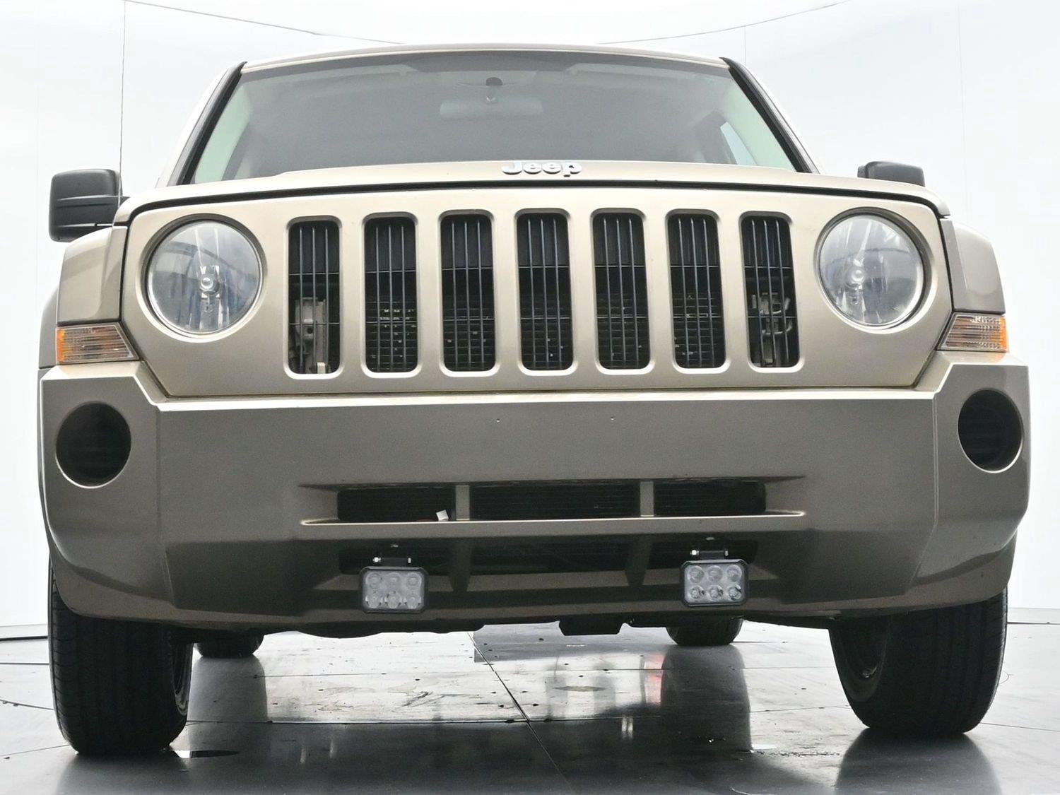 Used 2008 Light Khaki Metallic Jeep Sport image 39