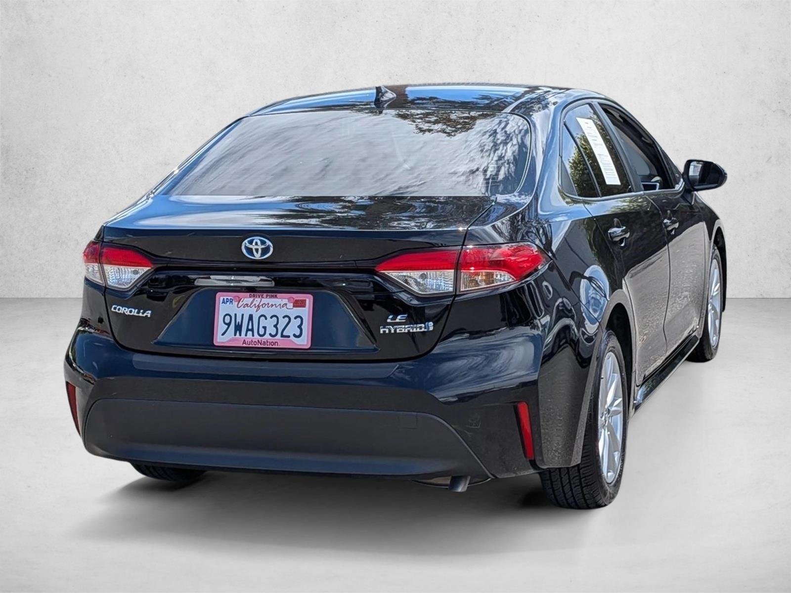 Used 2024 Midnight Black Metallic Toyota Hybrid LE image 5