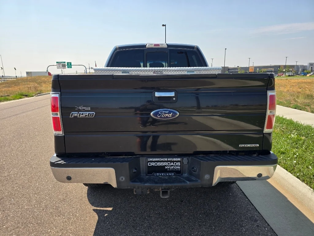 Used 2011 Tuxedo Black Metallic Ford XLT image 4