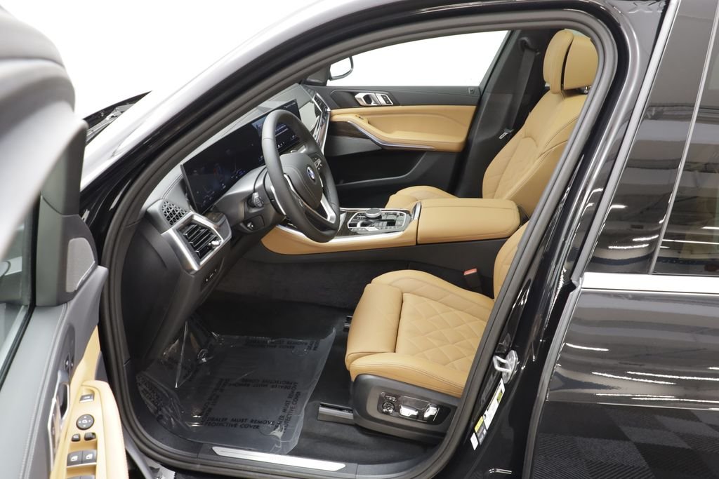 New 2026 Black Sapphire Metallic BMW xDrive50e image 7