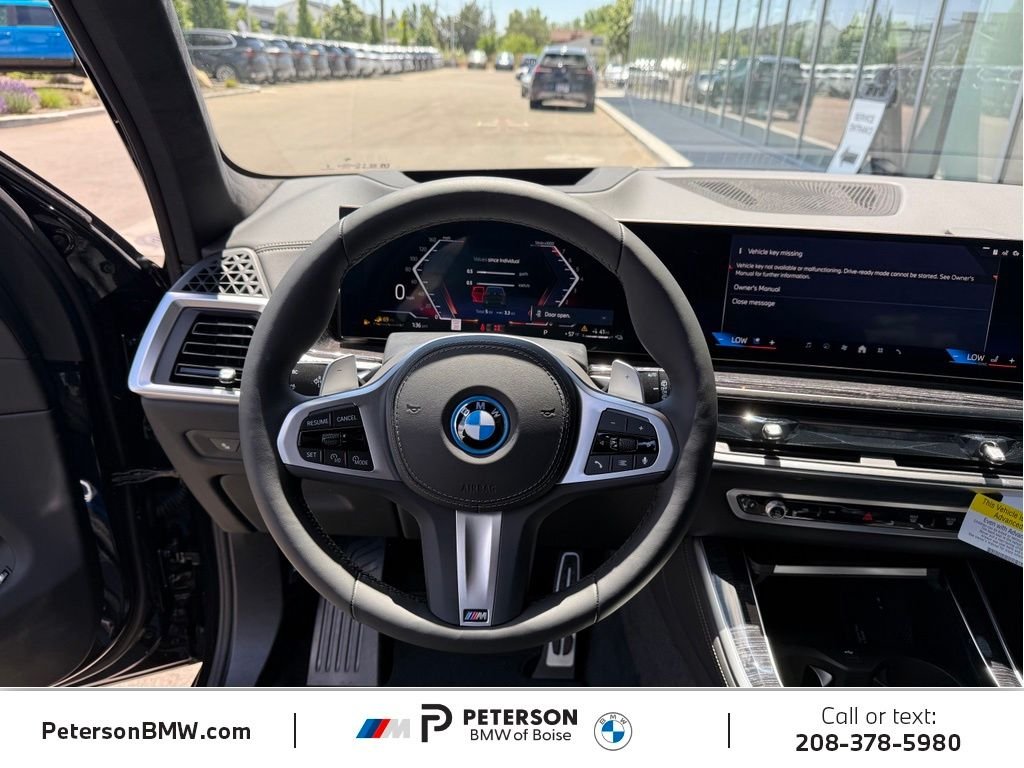 New 2026 Black Sapphire Metallic BMW xDrive50e image 22