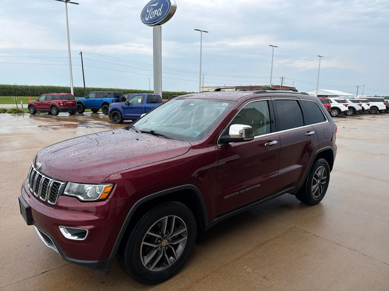 Used 2017 Velvet Red Pearlcoat Jeep Limited image 6