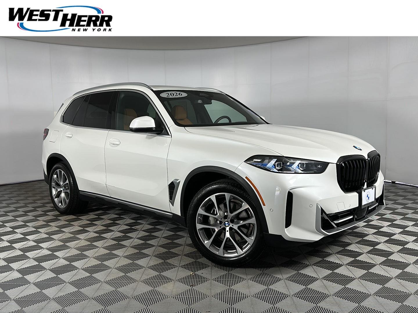 Used 2026 Mineral White Metallic BMW xDrive40i image 1