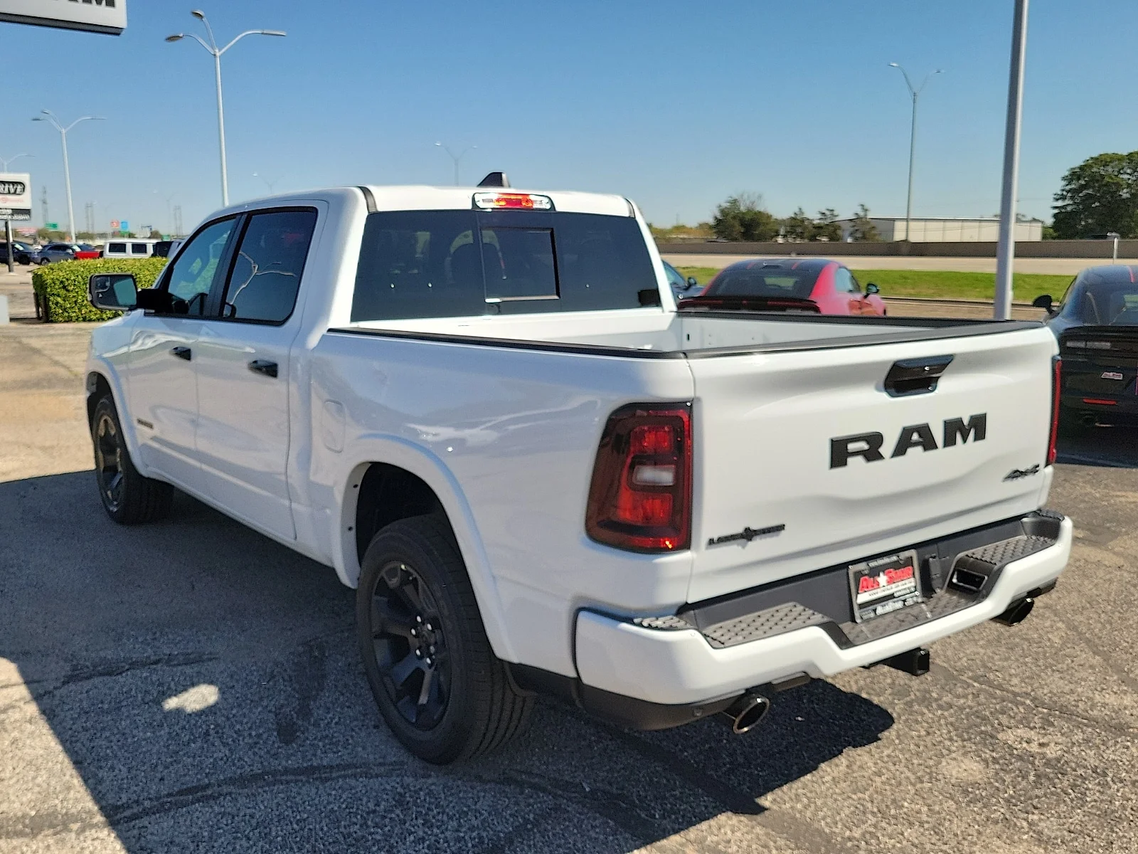 New 2027 Bright White Ram LONE STAR CREW CAB 4X4 5