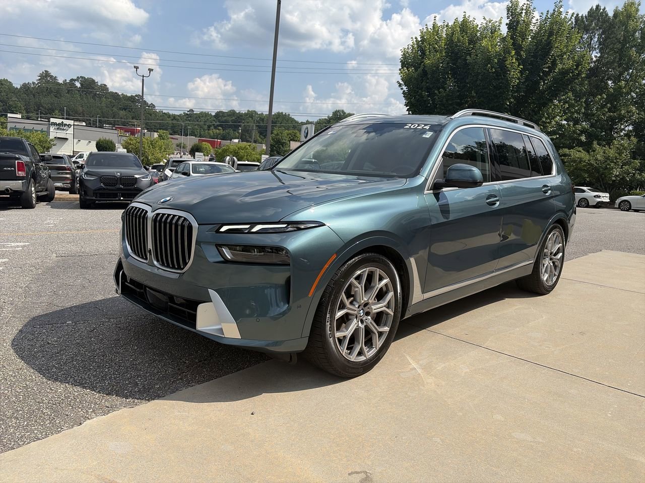 Used 2024 Blue Ridge Mountain Metallic BMW xDrive40i image 4