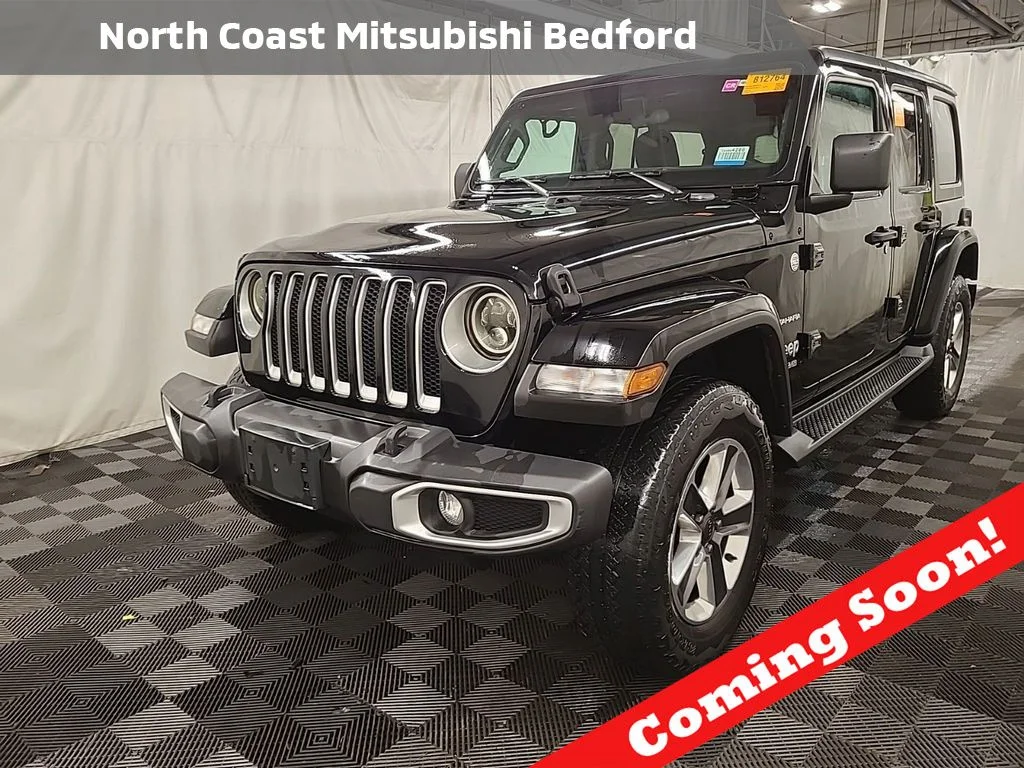 Used 2021 Black Jeep Unlimited Sahara image 1