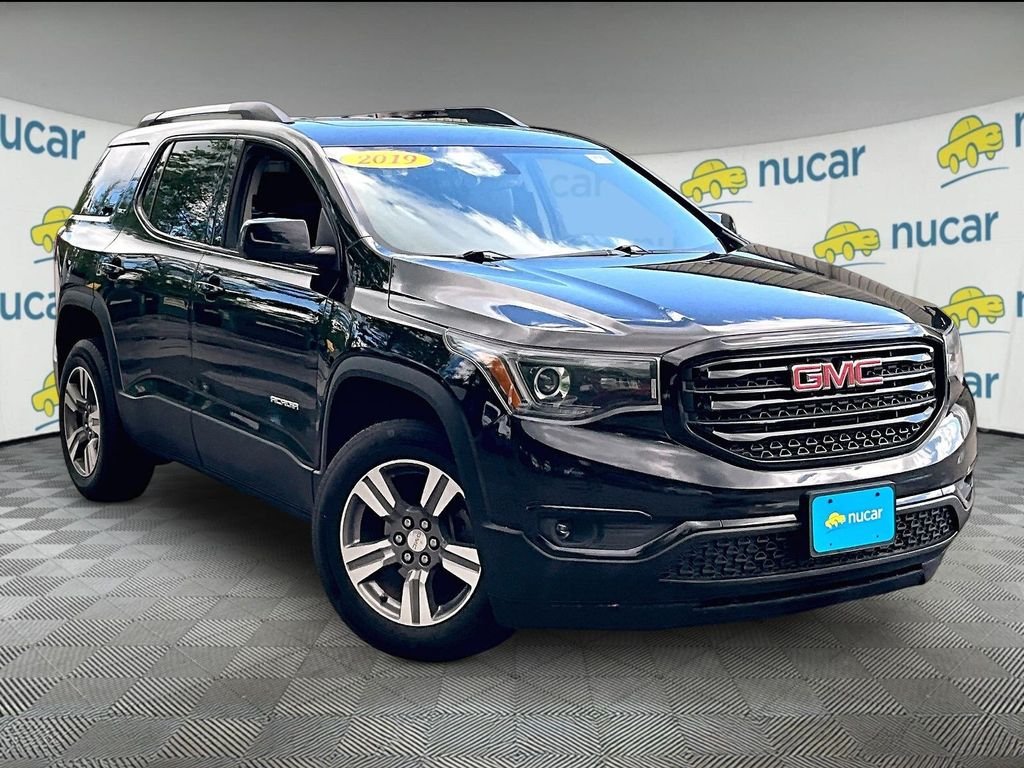Used 2019 Ebony Twilight Metallic GMC SLT-1 image 1