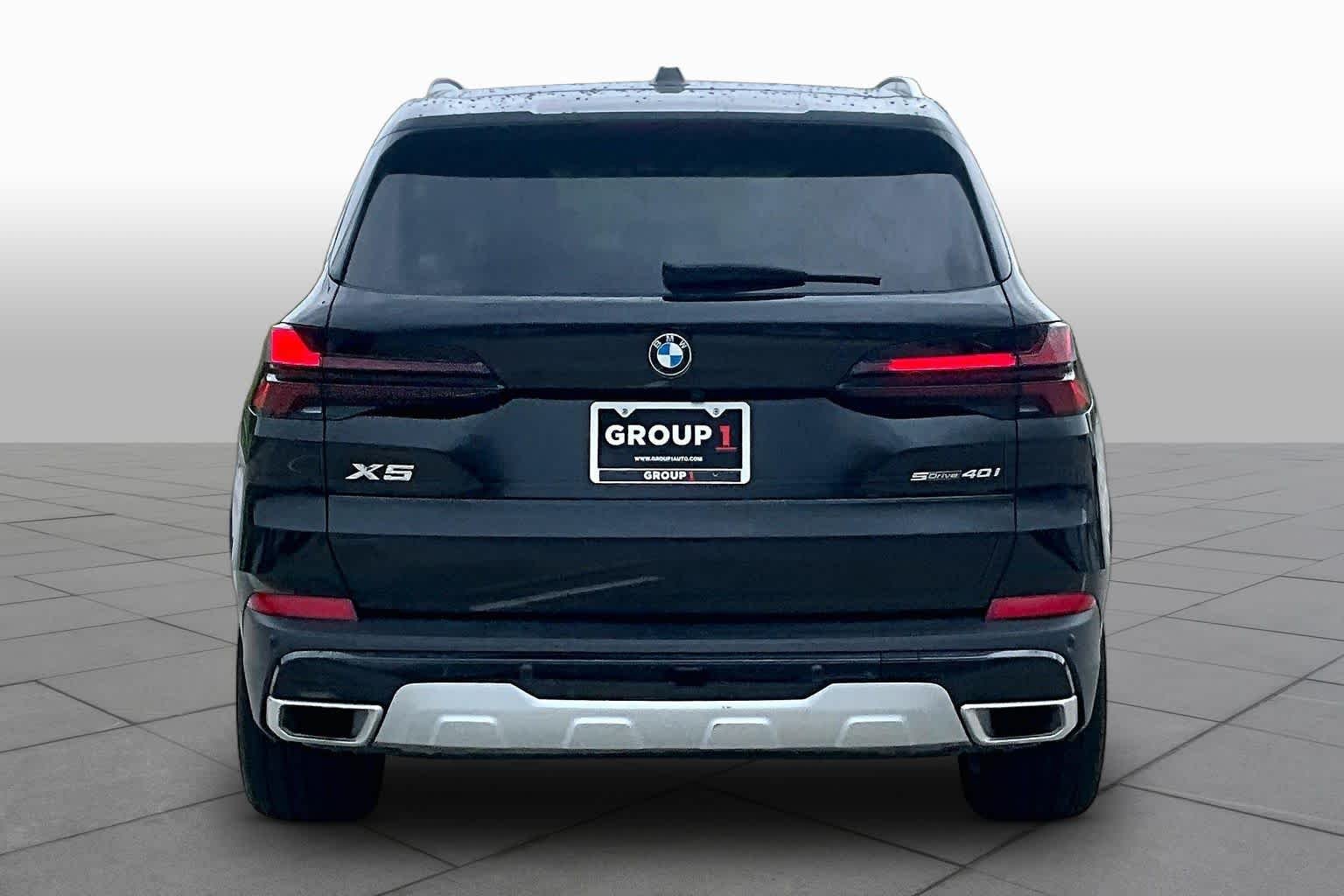 Used 2026 Black Sapphire Metallic BMW sDrive40i image 4