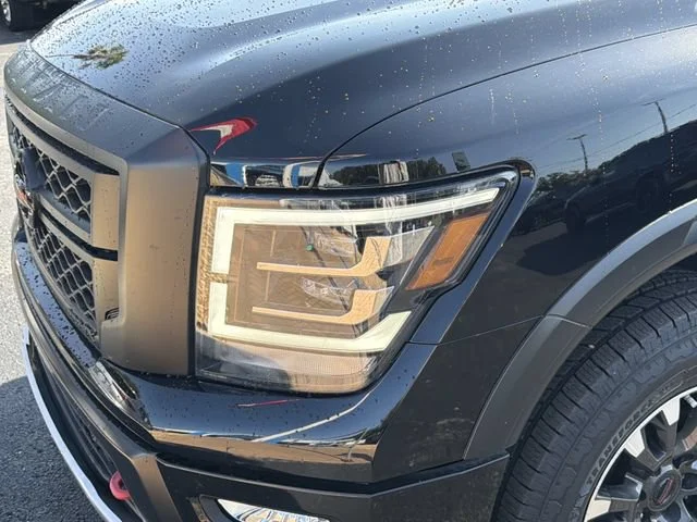 Used 2022 Black Nissan Crew Cab PRO-4X 4x4 image 8