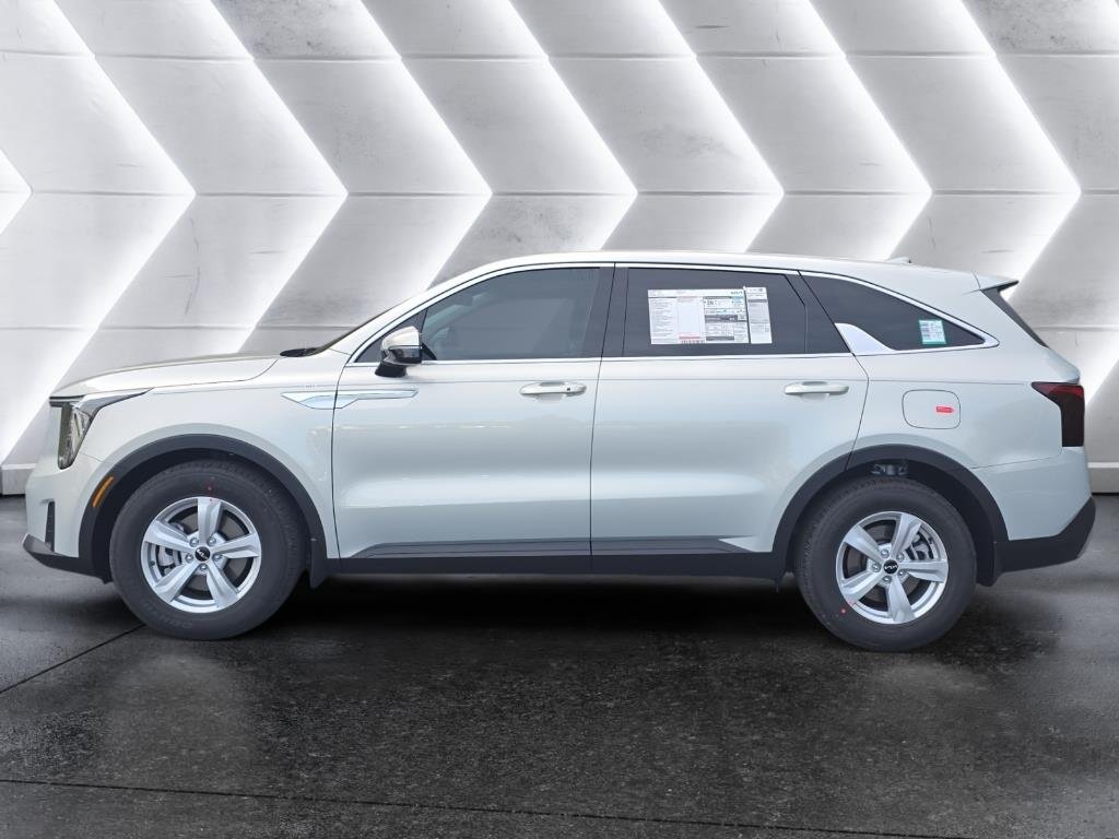 New 2026 Ivory Silver Kia LX image 2