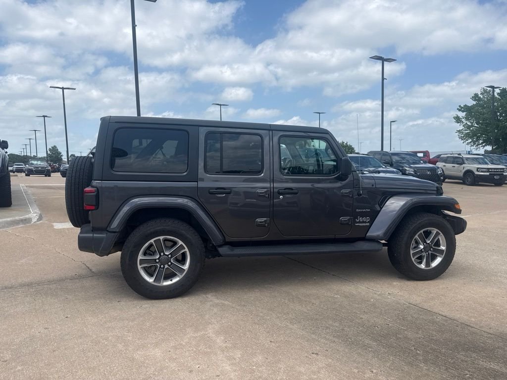 Used 2019 Granite Crystal Clearcoat Metallic Jeep Unlimited Sahara image 5