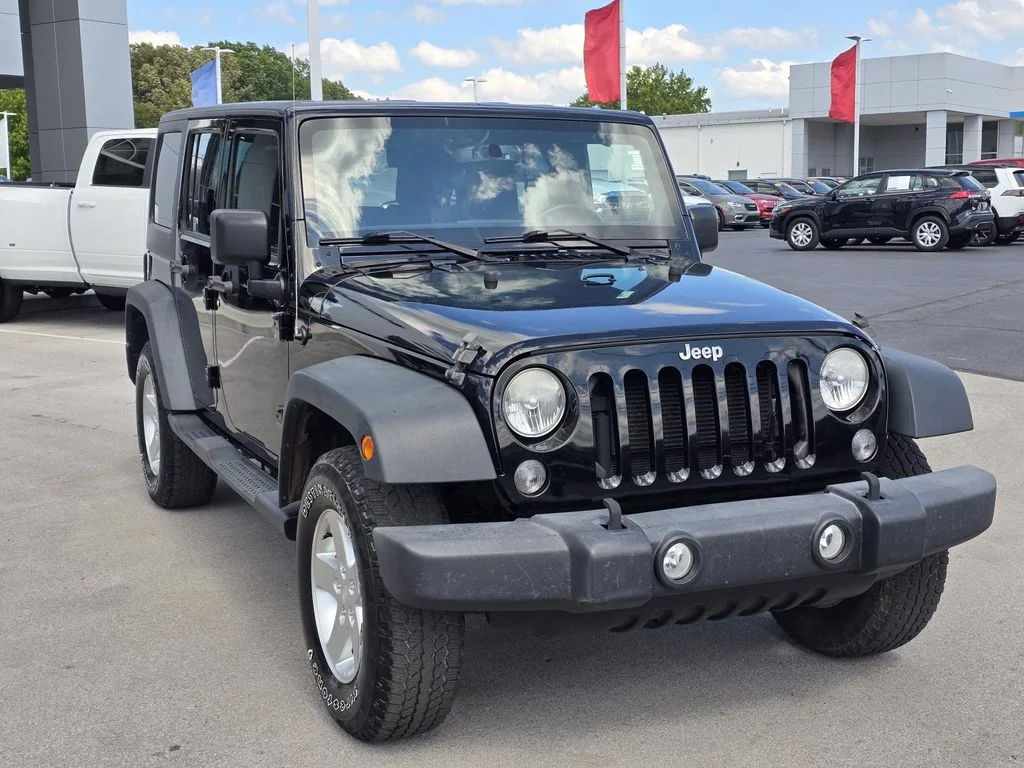 Used 2014 Black Clearcoat Jeep Sport image 4