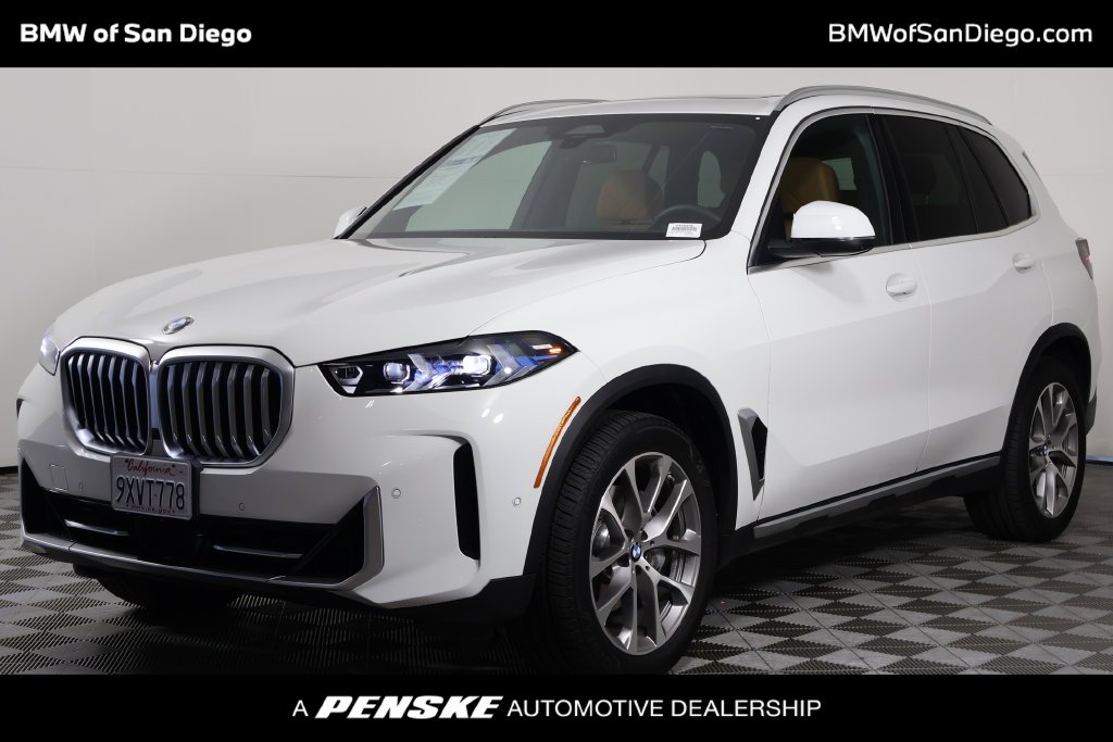 Certified Used 2026 Alpine White BMW sDrive40i image 1