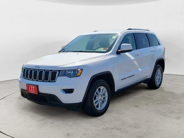 Used 2018 Bright White Jeep Laredo E image 1