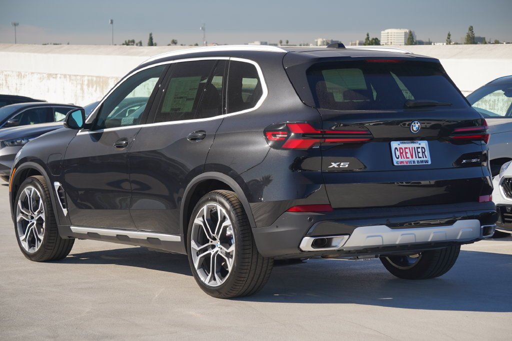 Used 2026 Black Sapphire Metallic BMW xDrive50e image 8