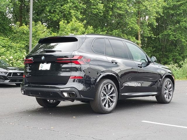 New 2026 Black Sapphire Metallic BMW xDrive40i image 7