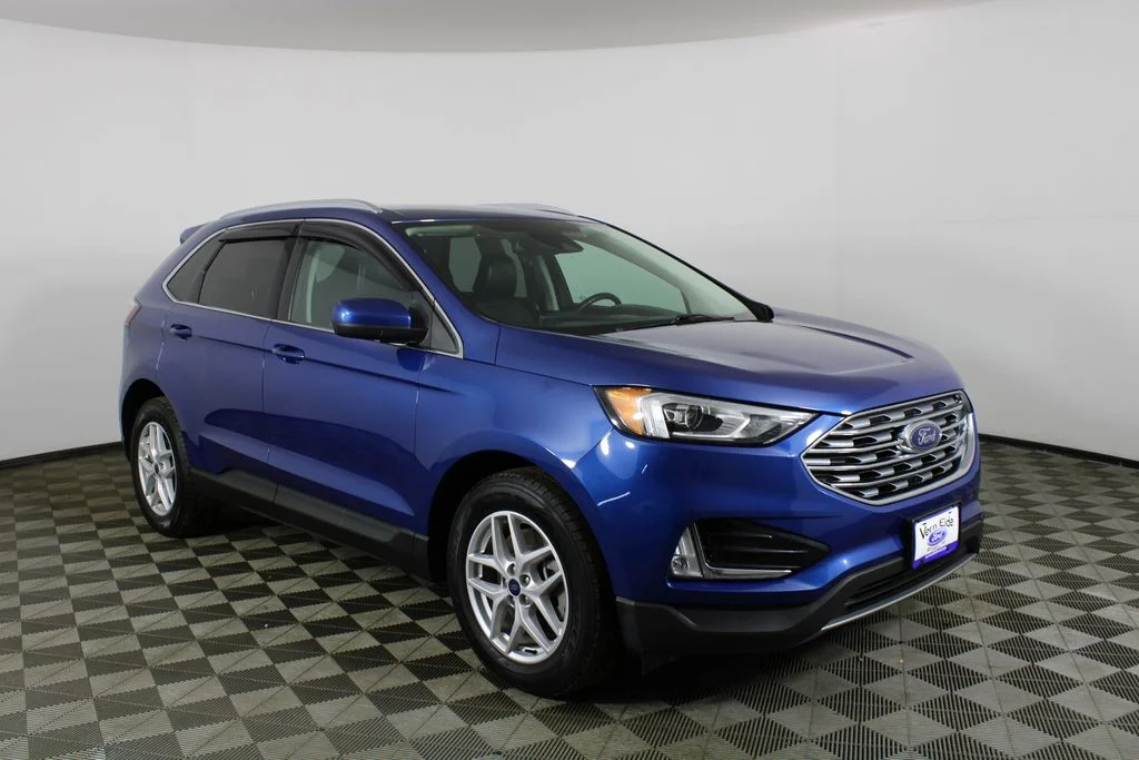 Used 2021 Blue Metallic Ford SEL image 1